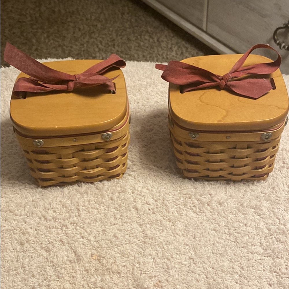 2 sweetheart longaberger baskets with the protectors